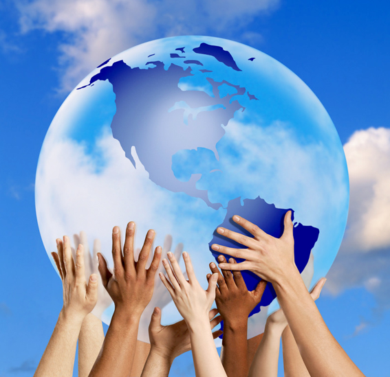 Hands touching a globe