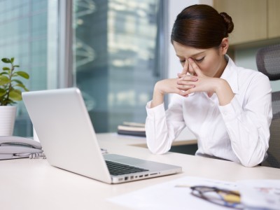 Tired Woman Near Computer